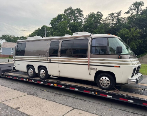Hauling a 2012 Winnebago motorhome.