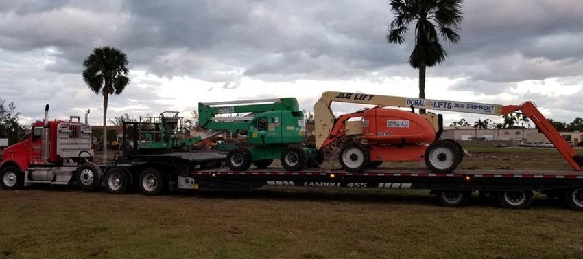 Boom lift transportation and reach lift transport
