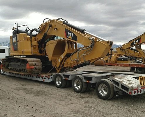 how much does it cost to ship a car - Bulldozers Transportation Services with We Will Transport It 2 495x400 - How much does it cost to ship a car Bulldozers Transportation Services with We Will Transport It how much does it cost to ship a car