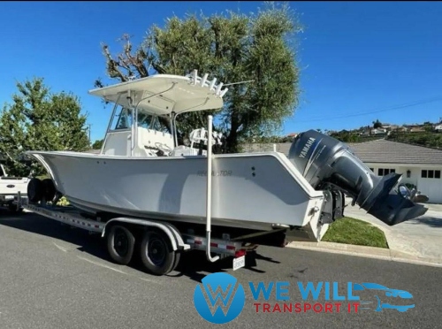 Hauling a center console boat on a tandem-axle boat trailer.