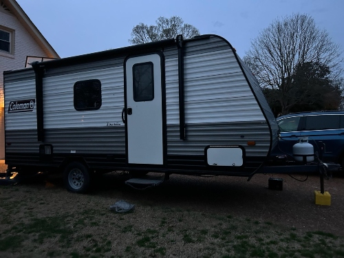Transporting a Coleman Lantern LT travel trailer RV.