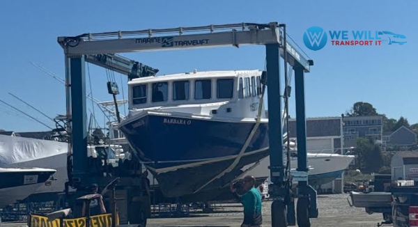 Commercial Fishing Boat being hauled out of the water to be transported from Freeport, Texas to Newport Beach, California.