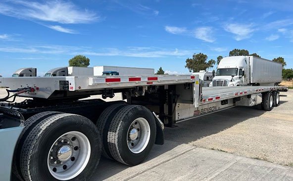 Drop deck trailer farm equipment transport