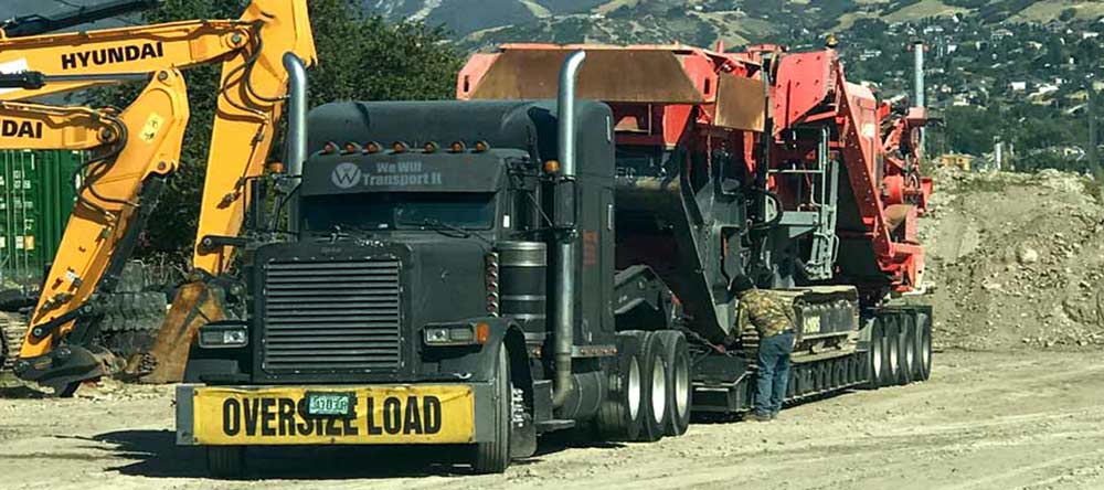 Hauling-Trucks-1 Hauling oversized red truck