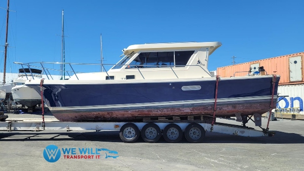 Hauling a Albin 35 Tournament Express boat on a quad-axle bunk boat trailer from San Diego, California to West Linn, Oregon.