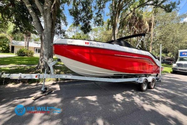 Hauling a Bayliner DX series deck boat on a tandem-axle bunk boat trailer from Chesapeake Bay, Maryland to Fort Lauderdale, Florida.