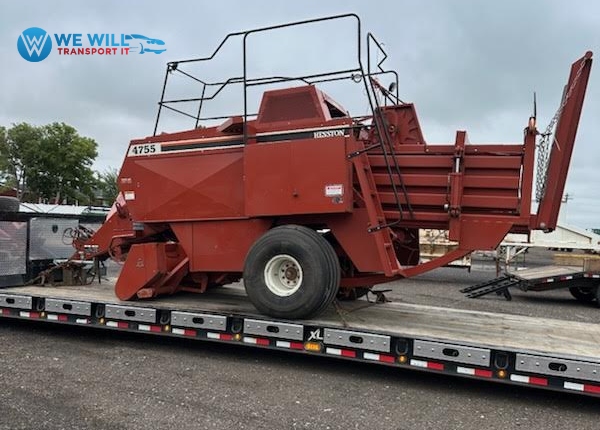 Hauling a Hesston 4755 Large Square Baler on a lowboy trailer from Kearney, Nebraska to Oakland, California.