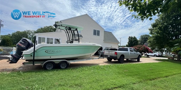 Hauling a Robalo R222 Center Console Fishing Boat on a tandem axle bunk boat trailer from Lake Lanier, Georgia to Smith Mountain Lake, Virginia.