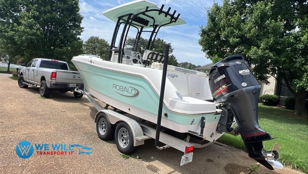 Hauling a Robalo R222 Center Console on a tandem-axle aluminum bunk boat trailer from Beaufort, North Carolina to St. Petersburg, Florida.