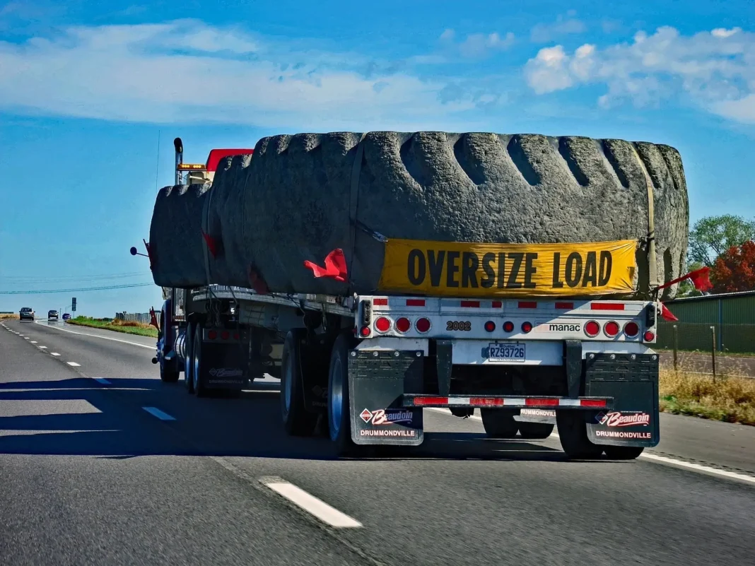 Case 580 Super M backhoe Heavy Equipment Transport from Idaho to Iowa