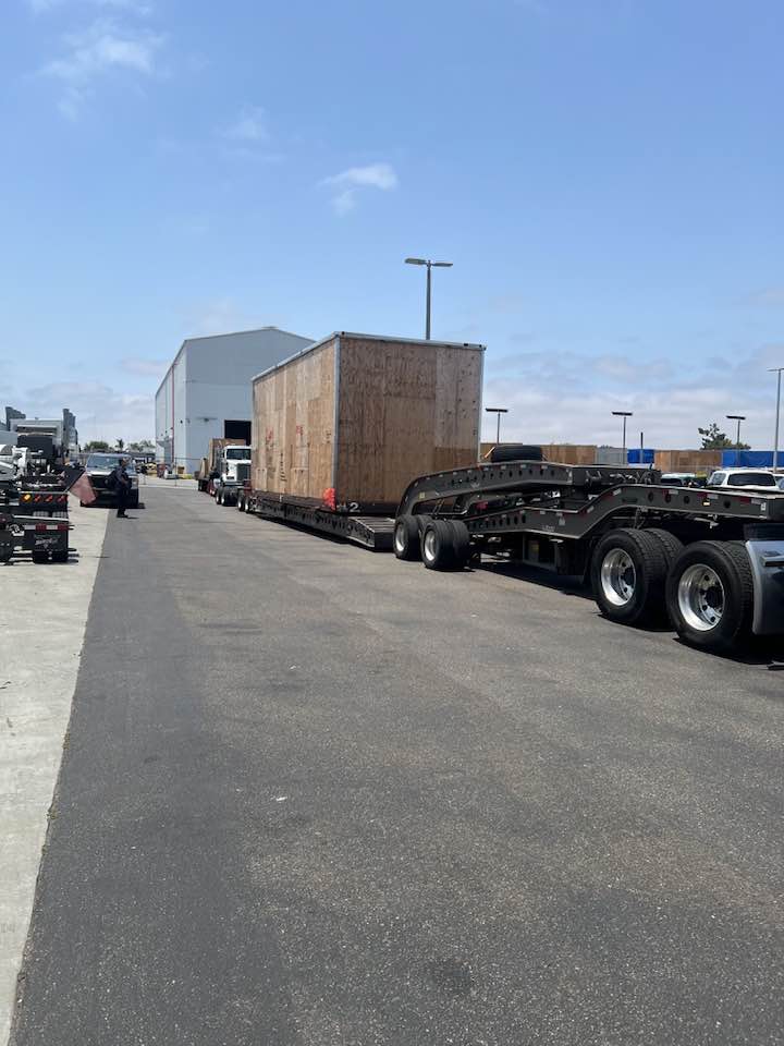 2016 Caterpillar 573C Heavy Equipment Transport from Washington to Iowa