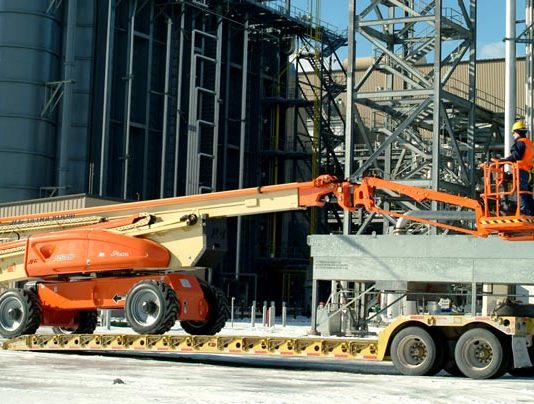 Heavy Equipment Transport from North Dakota to Montana JLG transport