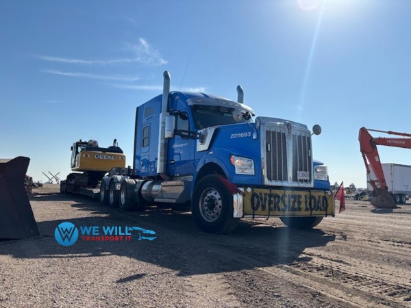 John Deere Excavator transport on a RGN trailer from Greensboro, North Carolina to Fort Collins, Colorado.