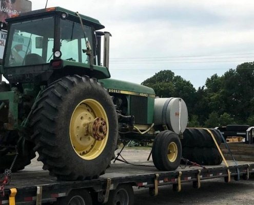 car transport services - John Deere Tractor Shipping Service we will transport it 495x400 - Car Transport Services: How Long Will it Take? John Deere Tractor Shipping Service, we will transport it car transport services