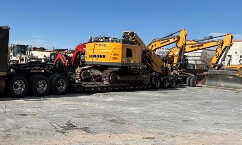Liebherr Excavator loaded on a 7 axle RGN for transport.