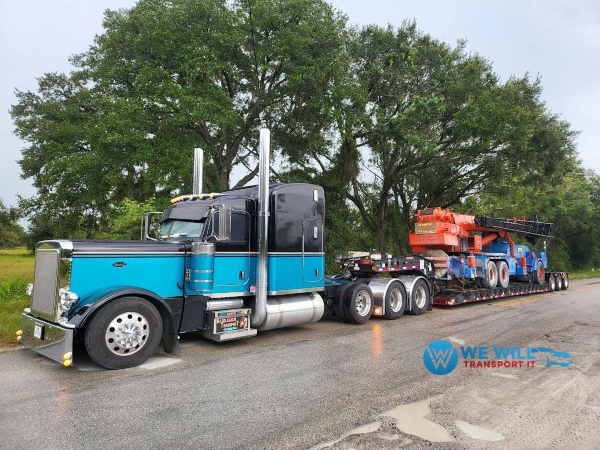 Transporting a Link-Belt 75RT Crane on a RGN trailer from Rockville, Connecticut to San Antonio, Texas.