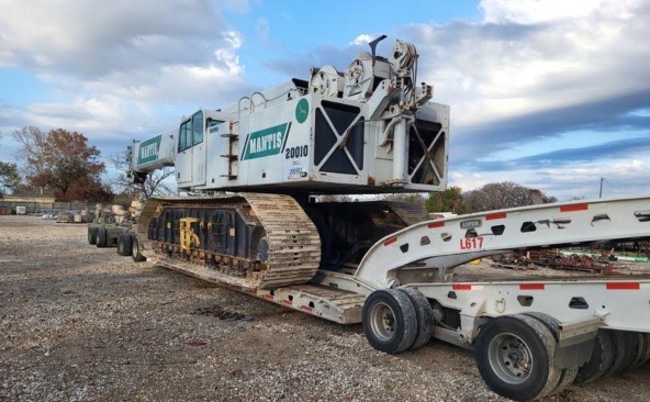 Hauling a Mantis 20010 Crawler Crane on a RGN trailer.
