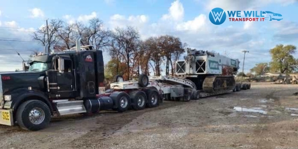 Hauling a Mantis Telescopic Boom Crawler Crane on a RGN trailer from Nashua, New Hampshire to Seattle, Washington.