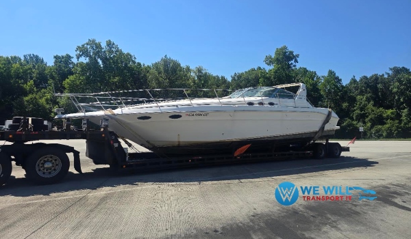 Transporting a 1997 Sea Ray 400 Express Cruiser on a hydraulic boat transport trailer from Savannah, Georgia to Miami, Florida.
