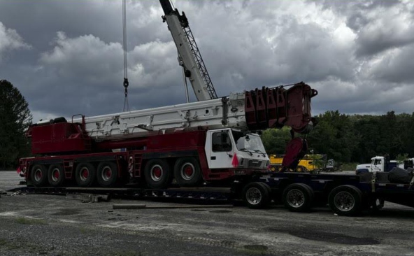 Shipping a 2001 Grove hydraulic mobile crane across the country that was loaded onto a 12 axle detachable RGN trailer.