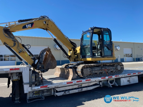 Moving a Cat 308 E2cr Mini Excavator on a step deck trailer from Dothan, Alabama to Tampa, Florida.