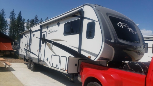 Transporting a Open Range Roamer fifth-wheel trailer.