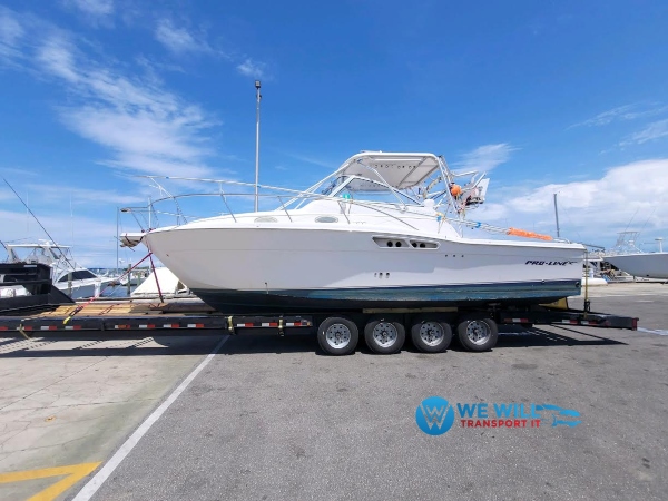 Pro-Line 32 Express boat transportation on a quad-axle boat trailer from Erie, Pennsylvania to Lewiston, Maine.