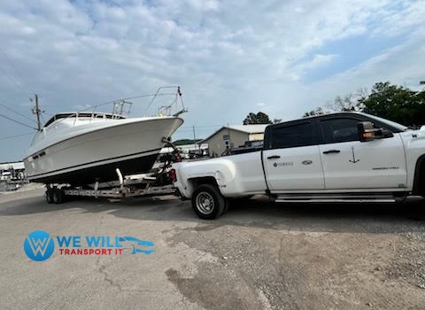 Sea Ray 300 Weekender Yacht transport on a specialized heavy-duty dual-axle bunk boat trailer from Conway, New Hampshire to Augusta, Georgia.