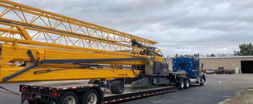 Self-Erecting Crane Transport and Hauling