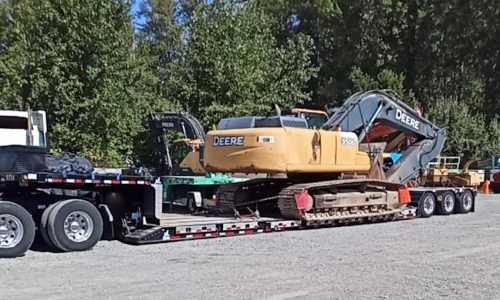Shipping John Deere 350g LC excavator on a RGN trailer.