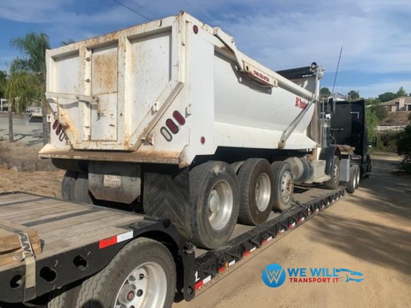 Shipping a 2013 Peterbilt 312 Dump Truck on a RGN trailer from Joplin, Missouri to Corvallis, Oregon.