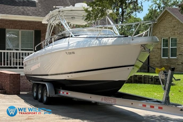 Intrepid Walkaround Powerboat transport on a triple-axle aluminum boat trailer from Annapolis, Maryland to Manhattan, New York.