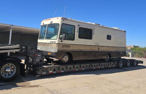 Shipping a Safari Trek Pathmaker Diesel motorhome on a RGN lowboy trailer.