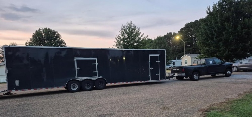 Transporting a 1986 Pontiac Fiero Kit car in a enclosed trailer.