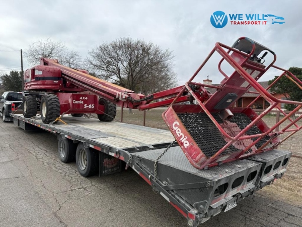 Transporting a Genie S65 Telescopic Boom Lift on a flatbed trailer from Bossier City, Louisiana to Chicago, Illinois.