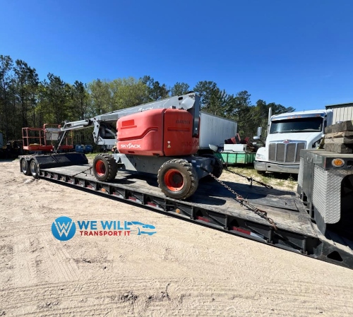 Transporting a Skyjack SJ46AJ Articulating Boom Lift on a RGN trailer from Buffalo, New York to Houston, Texas.