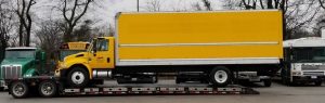 Truck-Transport-Service-3 Heavy Equipment Transport from Connecticut to Massachusetts