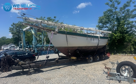 1977 Westsail 32 cruiser sailboat transport on a multi-axle boat trailer from Northport, New York to Weirton, West Virginia.