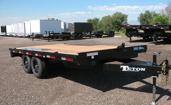 Flatbed trailer farm equipment transport